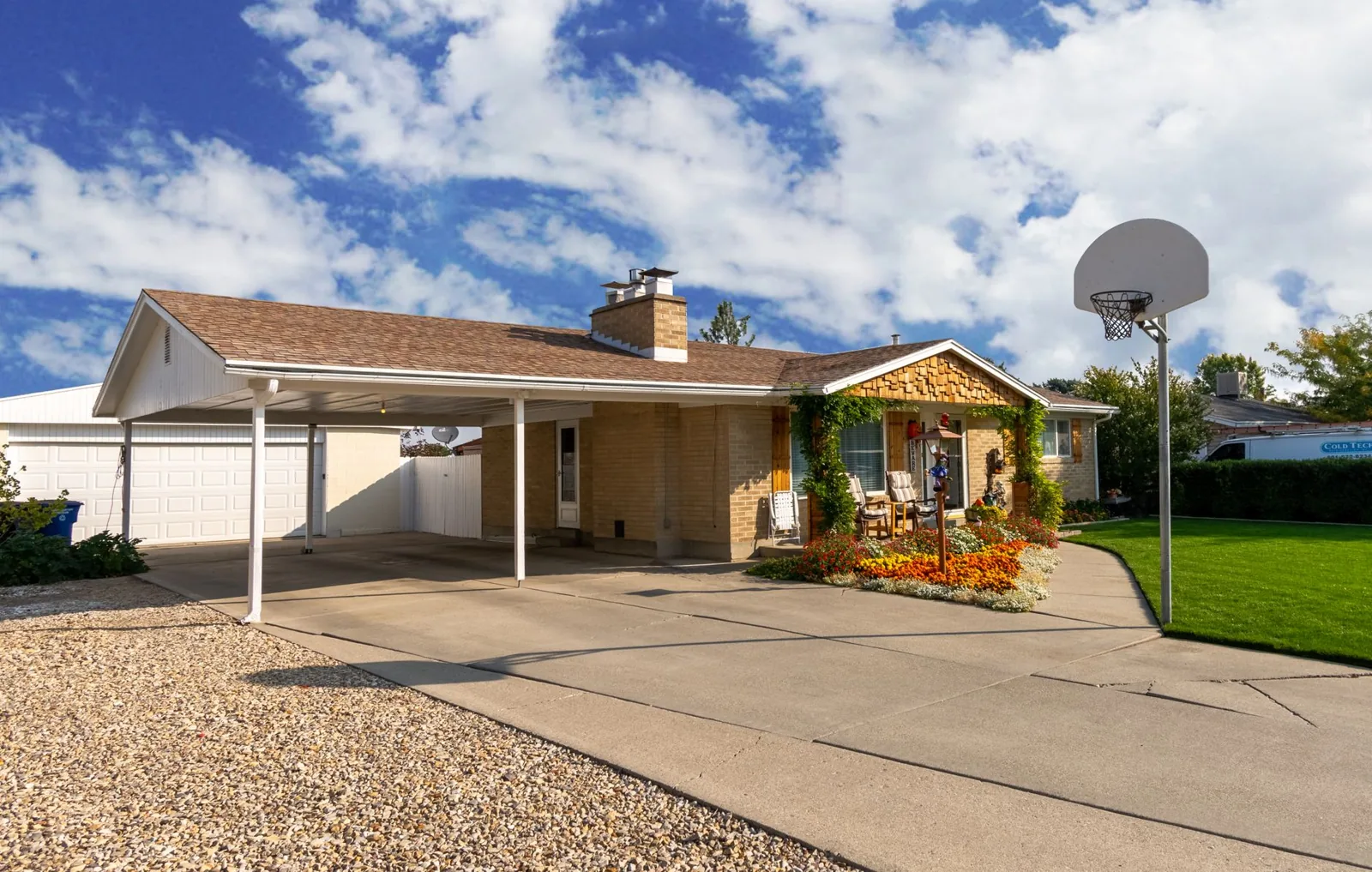 carport ideas for home featuring a wooden attached carport over a driveway
