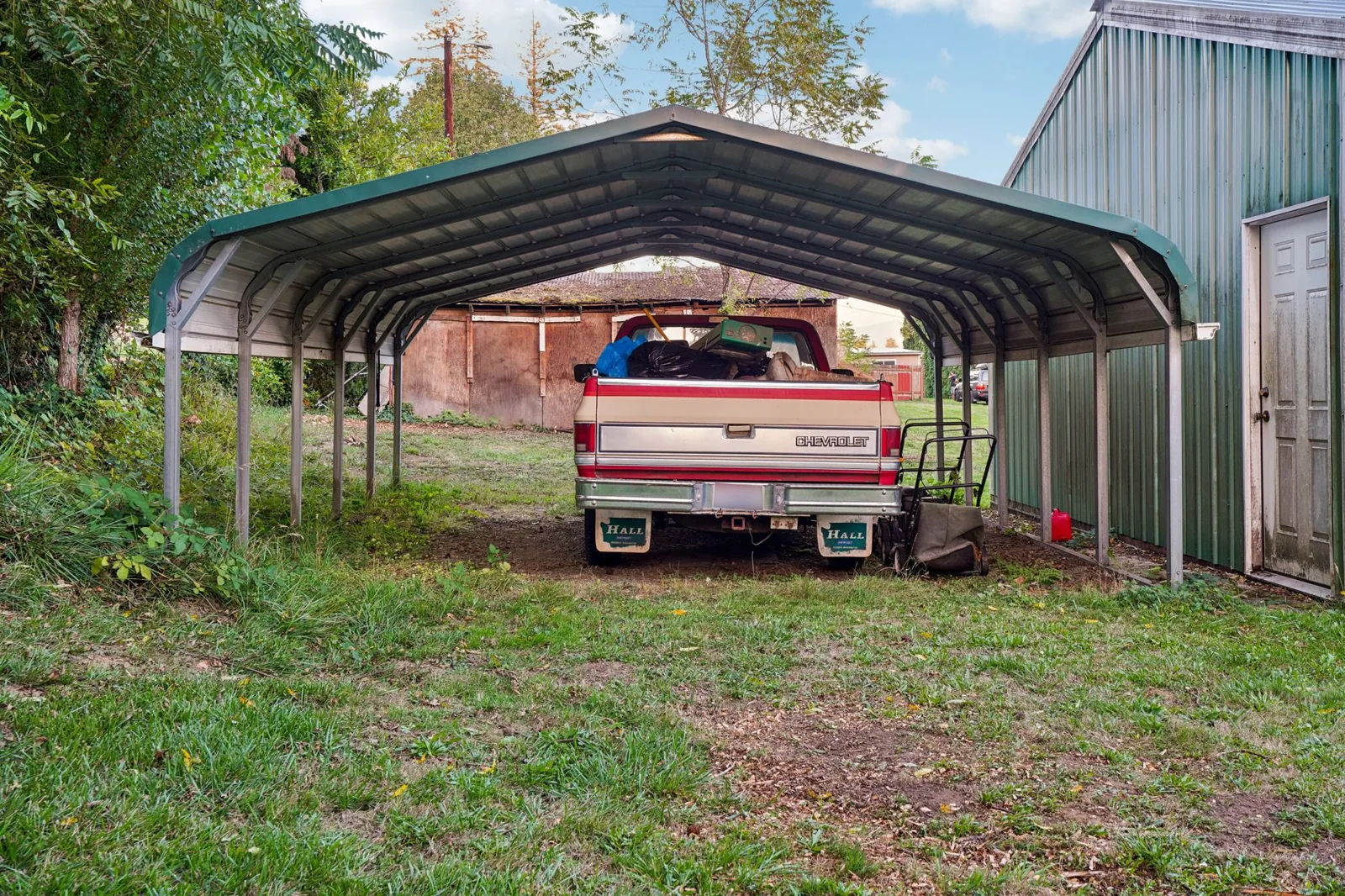 Metal carport cost depends on size, roof style, and steel gauge