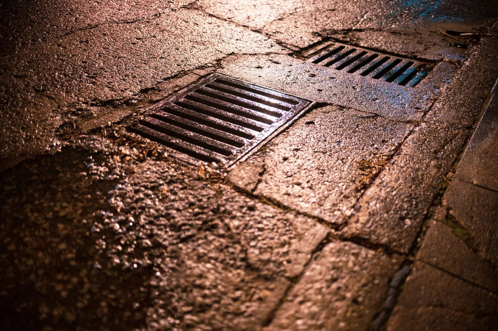 Backyard drainage solutions with a French drain and downspout extension