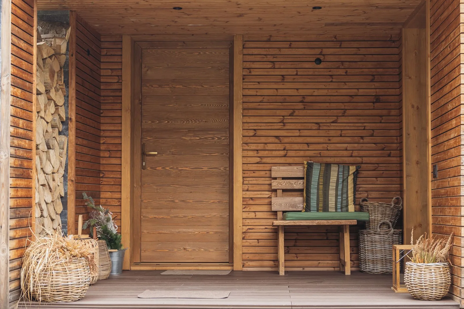 Wooden outdoor storage bench with hinged seat